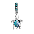 Silver turtle charm with blue accents on a white background