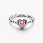 A silver Pandora ring featuring a heart-shaped pink gemstone in a halo setting, with small clear stones along the band. The inside of the band is engraved with 'PANDORA S 925 AU'.