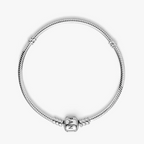 A silver snake-bone bracelet with a cylindrical bead charm engraved with the letters 'NAN', set against a clean white background.