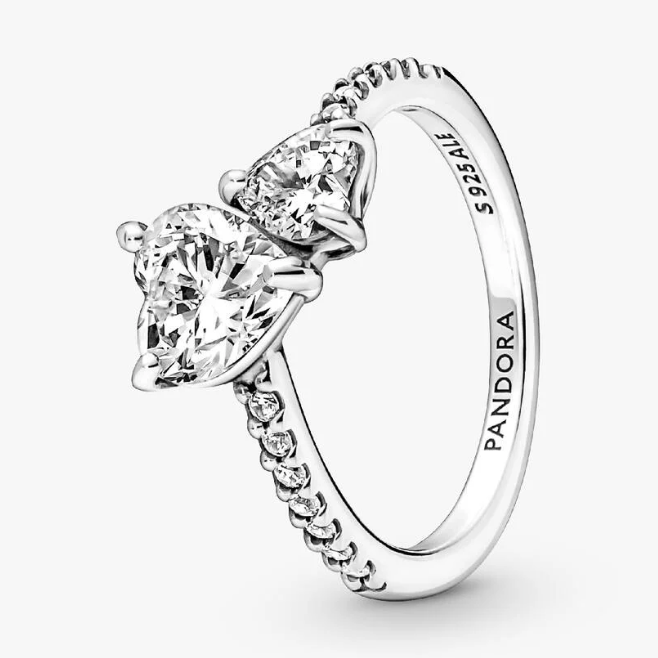 Pandora silver ring with a marquise-cut center stone and smaller stones along the band, shown on a light gray background.