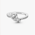 A silver Pandora ring with heart-shaped clear gemstones on a clean white background.