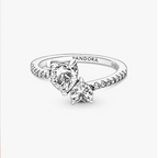 A silver Pandora ring with heart-shaped clear gemstones on a clean white background.